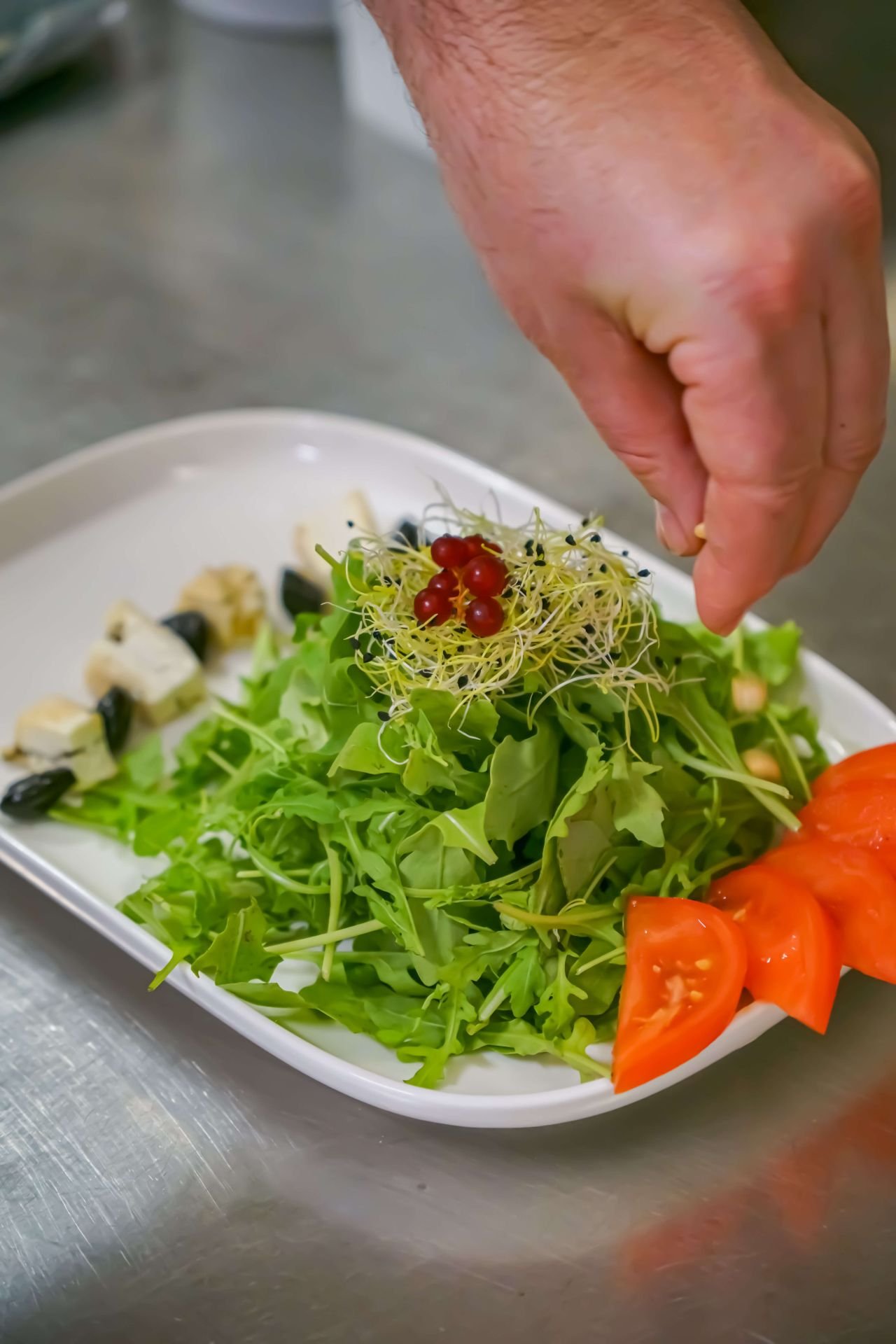 Plating a dish in the kitchen
